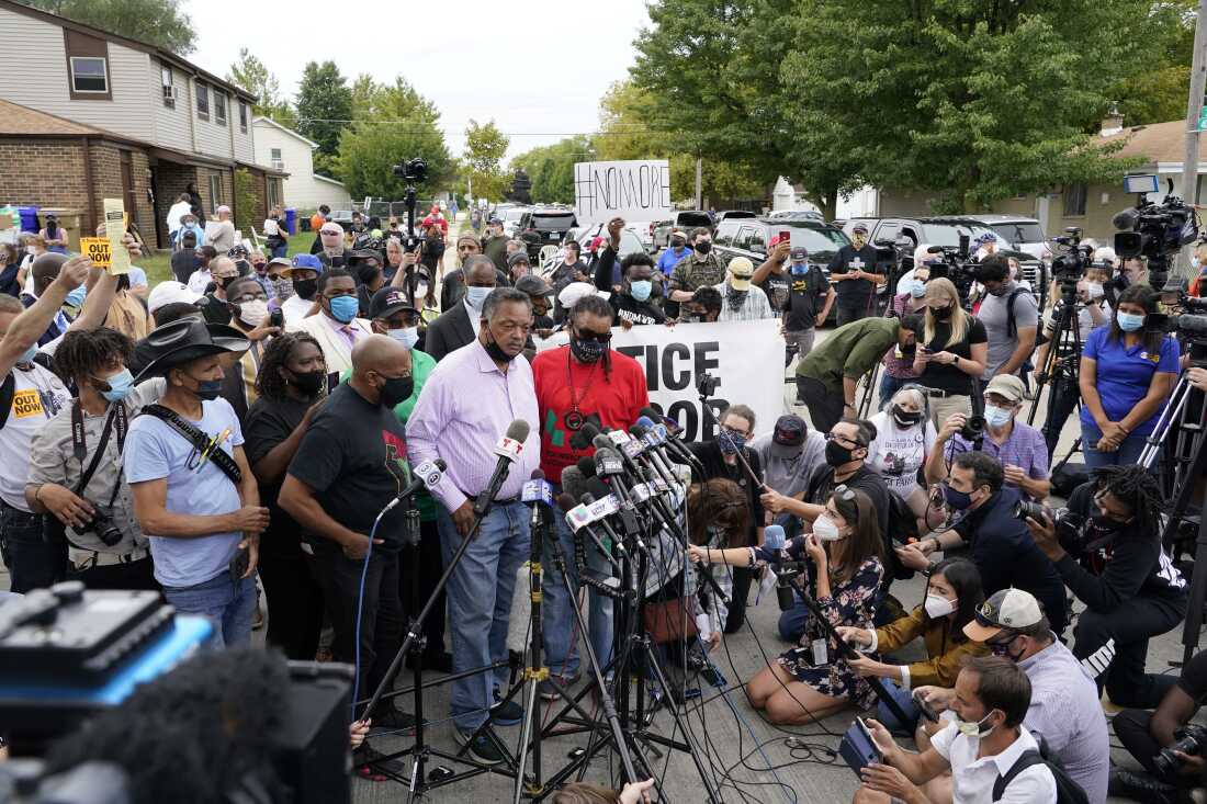 The Rev. Jesse Jackson speaks during a community gathering at the site of Jacob Blake's shooting Tuesday, Sept. 1, 2020, in Kenosha, Wis.