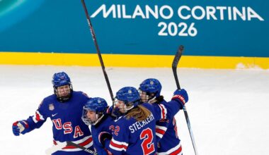 Olympic hockey arena lightens color of boards after feedback