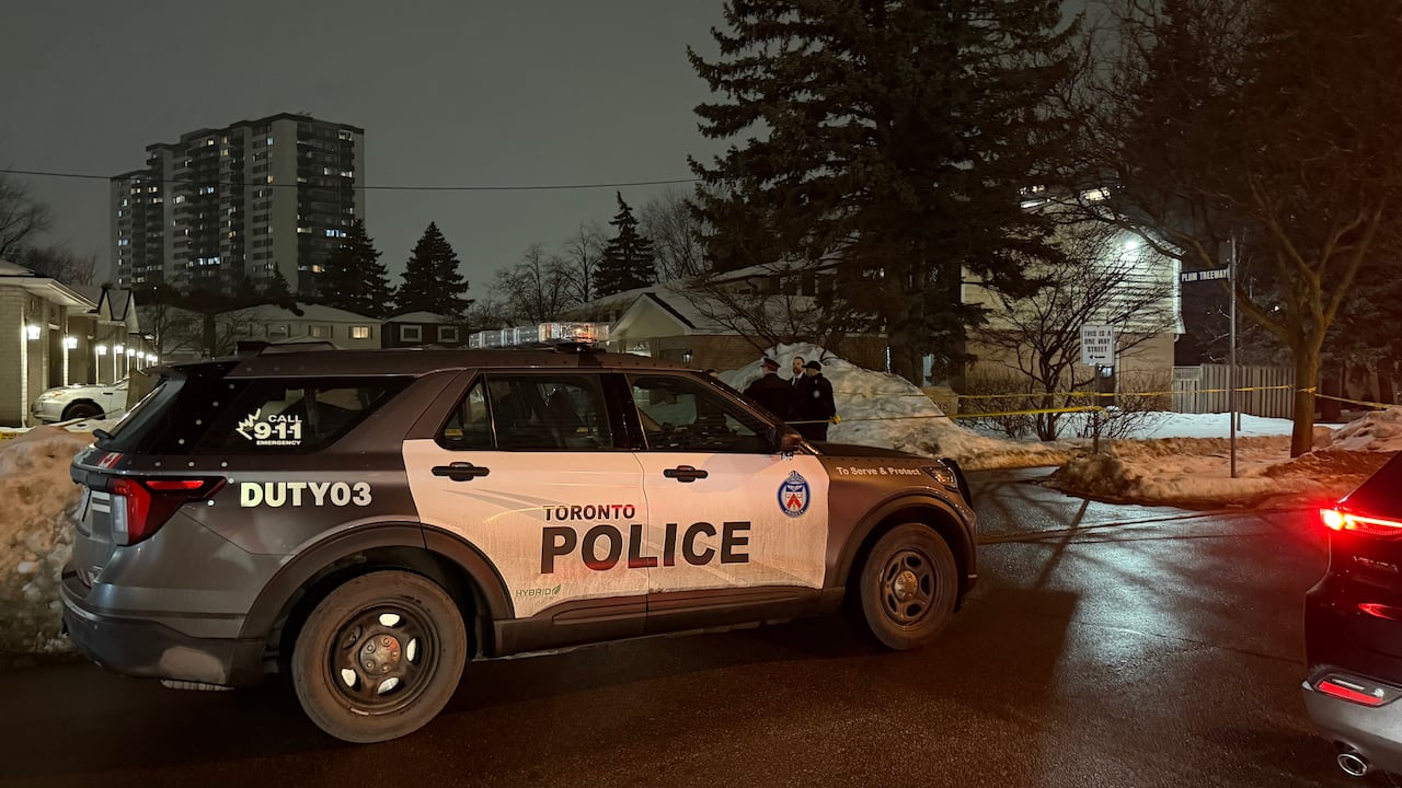 Toronto police car parked outside. 
