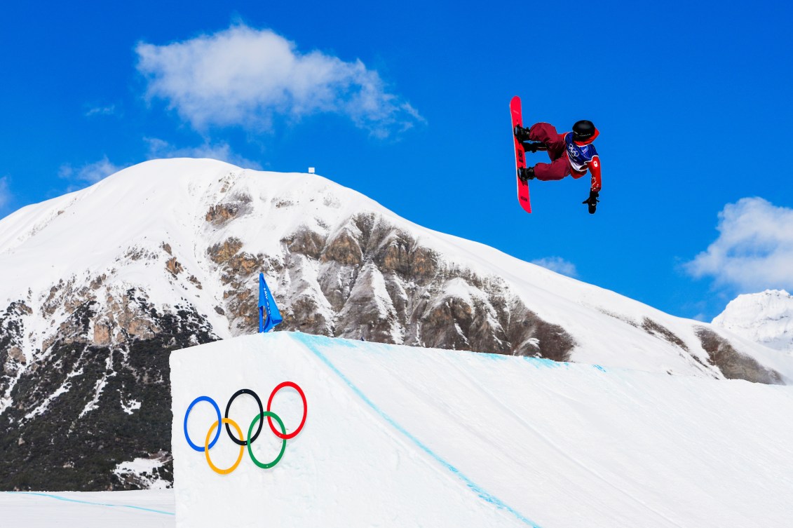 Mark McMorris warms up before competing in snowboard Slopestyle