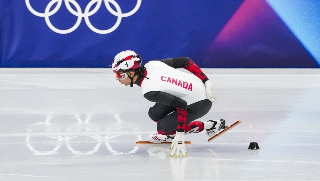 Team Canada’s William Dandjinou skating on the short track during 1000m semi-finals at the Milano Cortina 2026 Olympic Winter Games.