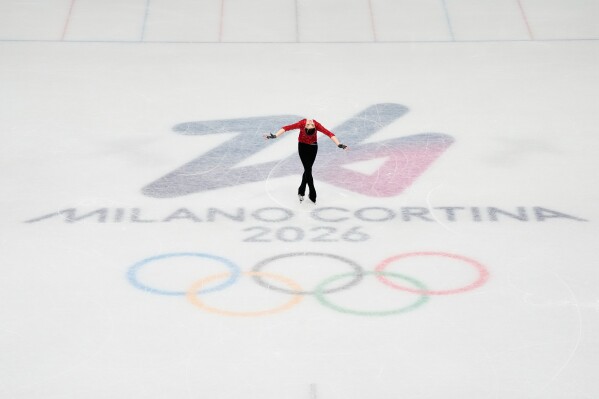 Adeliia Petrosian of Individual Neutral Athletes competes during the women's short program figure skating at the 2026 Winter Olympics, in Milan, Italy, Tuesday, Feb. 17, 2026. (AP Photo/Ashley Landis)