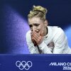 Amber Glenn reacts to her score in the women's short program event on Tuesday. She got docked for landing a double loop instead of a triple loop, despite an otherwise strong performance.