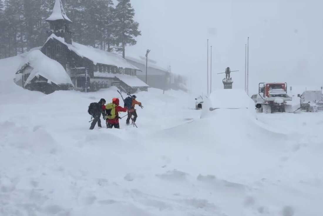 This image provided by the Nevada County Sheriff's Office shows members of a rescue team in Soda Springs, California on Tuesday, Feb. 17, 2026.