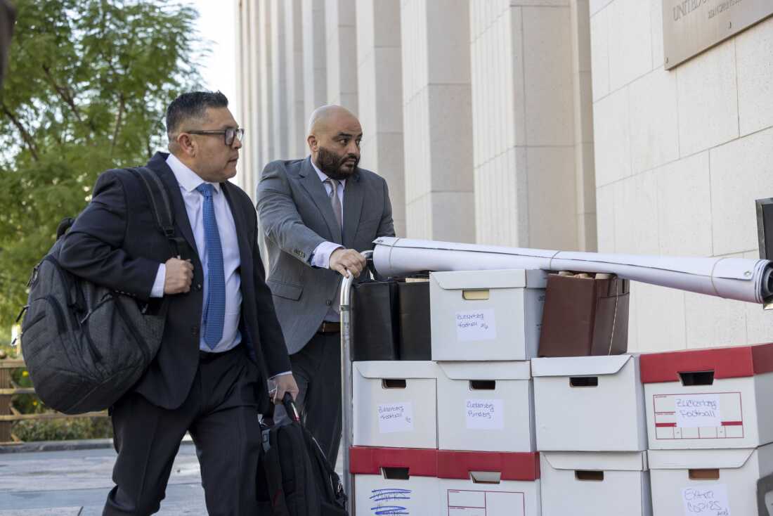 Files are brought inside the Los Angeles Superior Court on Feb 18, 2026 as part of a major trial involving Meta and Google over whether their products harm young people.