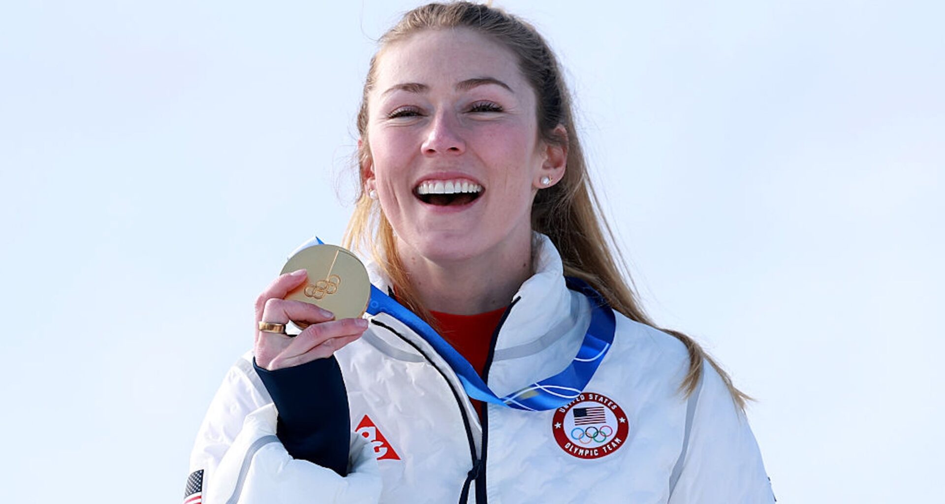 Gold medalist Mikaela Shiffrin of Team United States celebrates on the podium during the medal ceremony following the Women's Slalom Run on day twelve of the Milano Cortina 2026 Winter Olympics at Tofane Alpine Skiing Centre on February 18, 2026 in Cortina d'Ampezzo, Italy.
