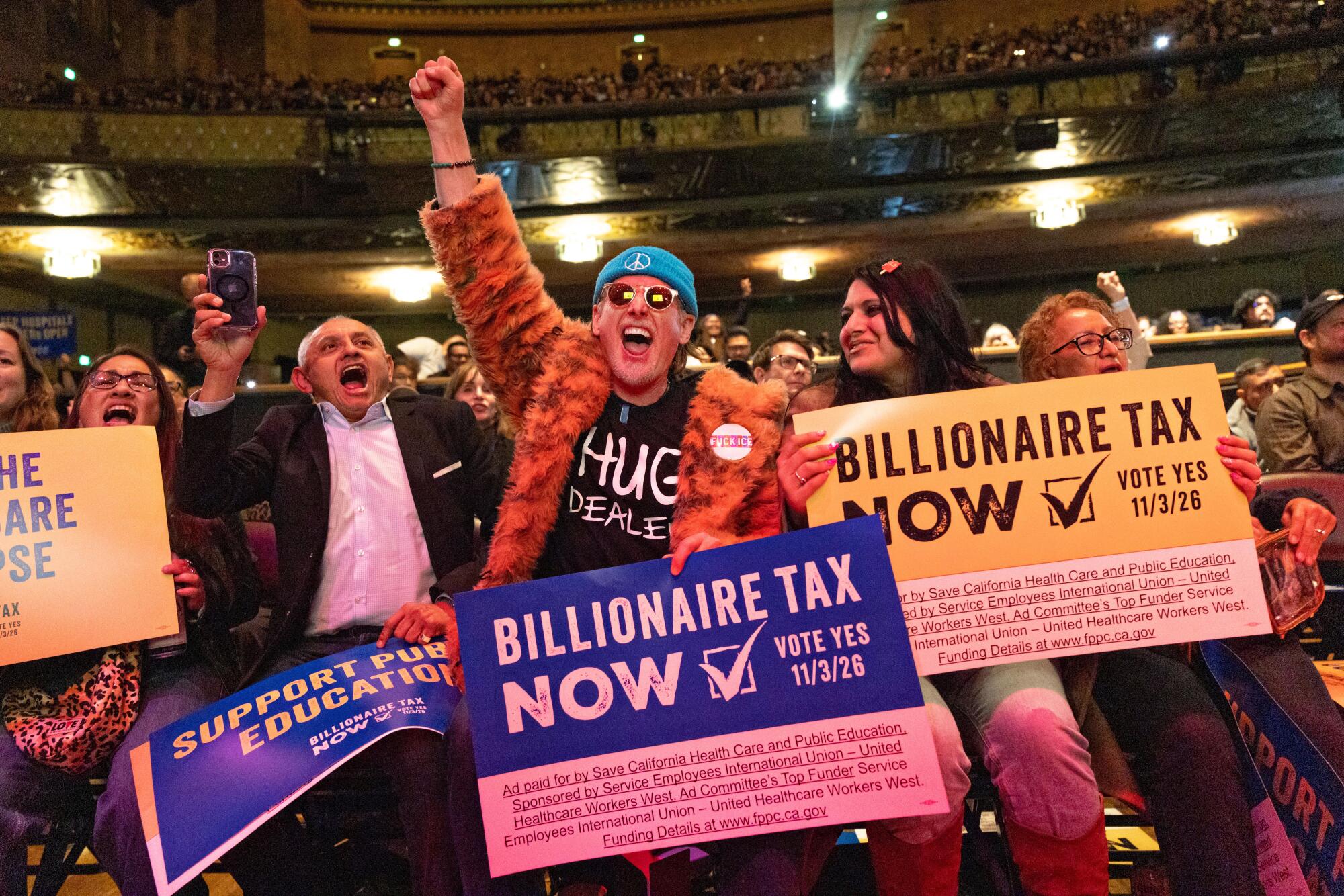 Keith Anthony Sikora among other supporters at the Billionaire Tax Now rally at The Wiltern in Los Angeles.