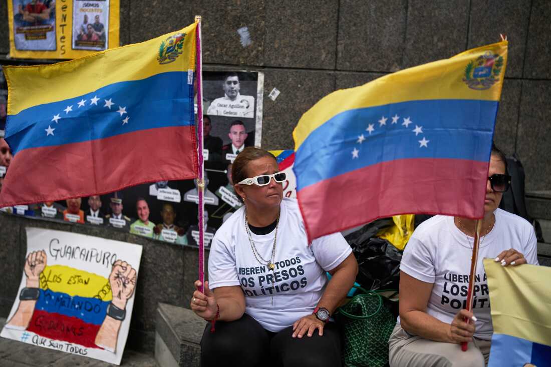 People who consider their detained family members to be political prisoners protest for their releases outside the United Nations office in Caracas, Venezuela, Wednesday Feb. 18, 2026.