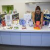 Librarian Sabrina Jesram arranges a display of books during Banned Books Week at a public library branch in New York City on Sept. 23, 2022.