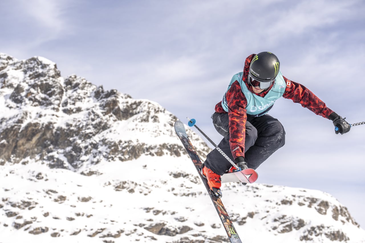 A skier does a jump.