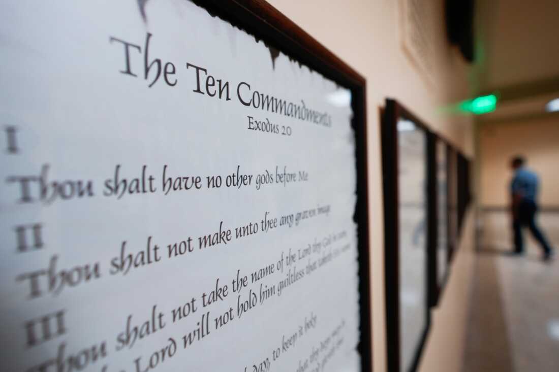 A copy of the Ten Commandments is posted along with other historical documents in a hallway of the Georgia Capitol, June 20, 2024, in Atlanta.