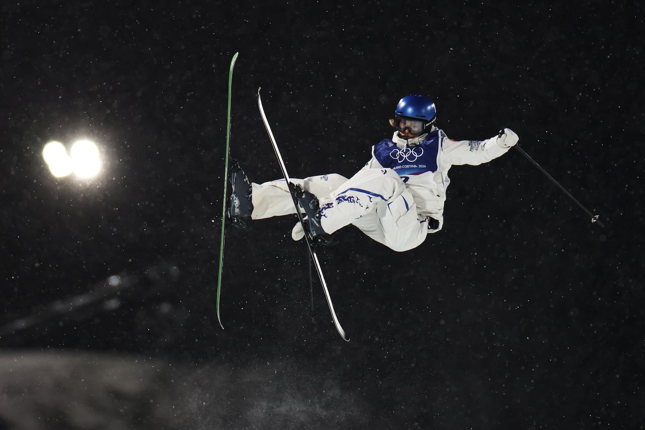 A skier in the air.