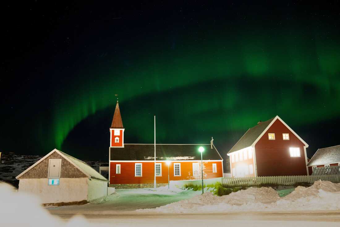 Northern Lights over the Church of Our Saviour in Nuuk, Greenland, Saturday Feb. 21, 2026. (Bo Amstrup/Ritzau Scanpix via AP)