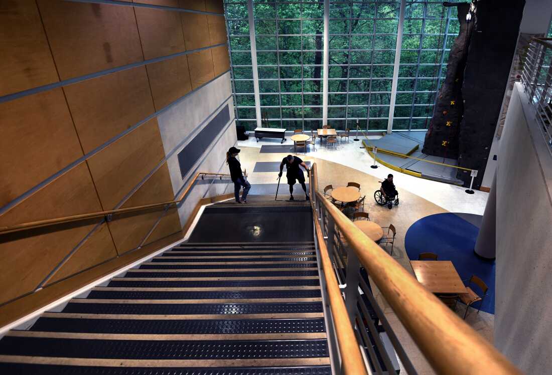 Sgt. Misha Varvarych, 28, a Ukrainian war amputee faces challenges with his new prosthetic legs during a stay at Lakeshore, an Olympic & Paralympic Training Site in Birmingham Alabama on April 7, 2023.