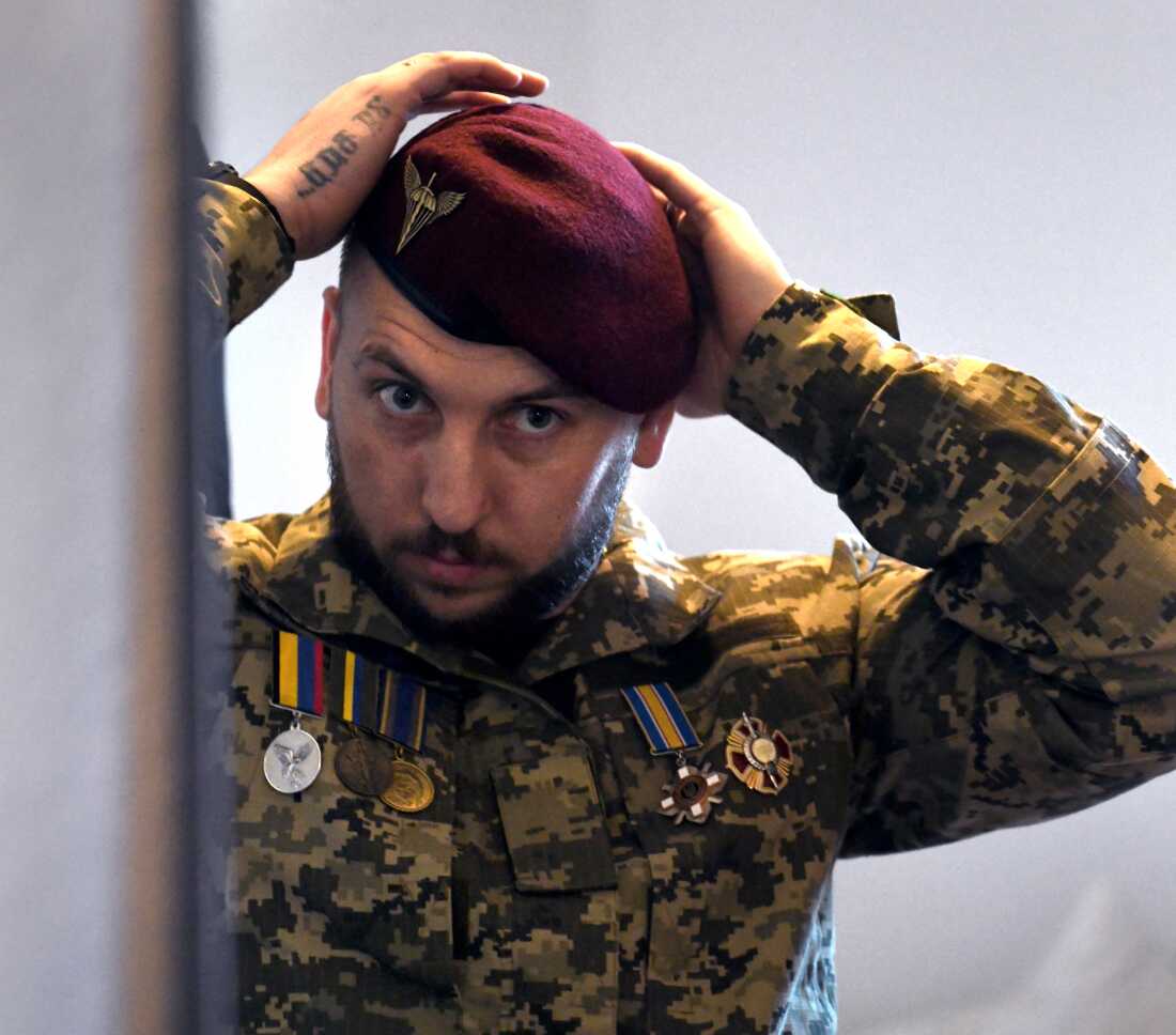 Sgt. Misha Varvarych, a Ukrainian 80th Airborne Assault Brigade commander, primped and preened as they got ready to attend a fundraiser gala in full uniform for Revived Soldiers Ukraine in Orlando FL on February 4, 2023. He formed a bond with the other soldiers as they laughed and struggled together while sharing group homes.