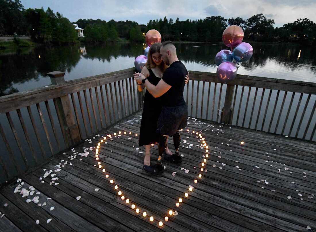 Sgt. Misha Varvarych, a Ukrainian amputee and his fiancé Ira Botvynska have a first dance with his new legs under a tropical moon after his marriage proposal