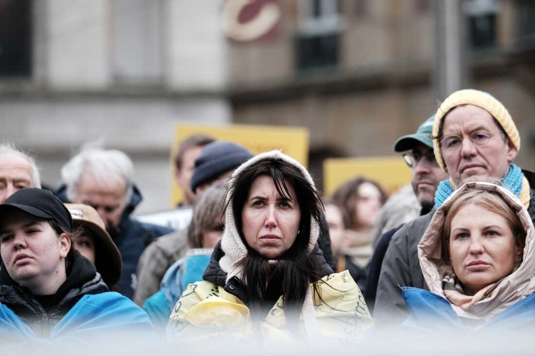 Members of the Ukrainian community and their supporters gather at Dam Square in Amsterdam on February 22, marking four years of Russia's full-scale invasion of Ukraine.