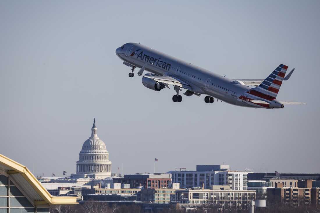 An American Airlines jet takes off from the Ronald Reagan Washington National Airport on January 29, 2026, on the anniversary of when 67 people died after a U.S. Army Black Hawk helicopter collided with a commuter jet over the Potomac River.