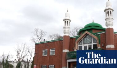Second suspect arrested after man with axe reportedly entered Manchester mosque | UK news