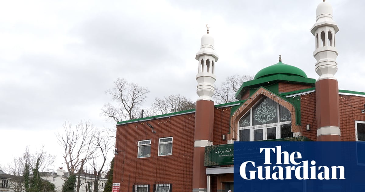 Second suspect arrested after man with axe reportedly entered Manchester mosque | UK news