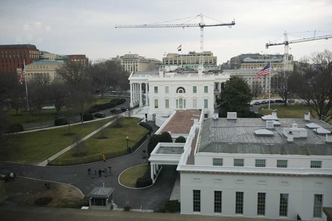 Cranes are seen on the grounds of the White House as construction work continues for U.S. President Trump's new ballroom in Washington, D.C., on Wednesday.
