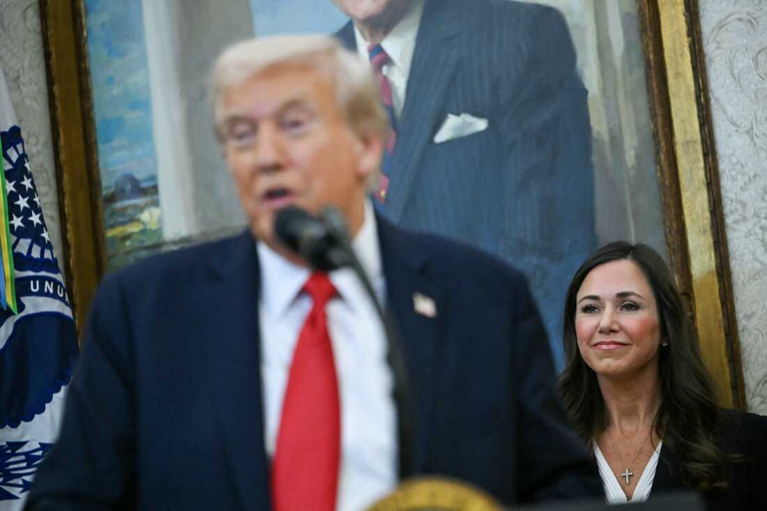 Britt listens as President Trump speaks in the Oval Office on Oct.16, 2025. Britt has been a reliable vote for the president's agenda, but criticized a racist video posted on his social media.
