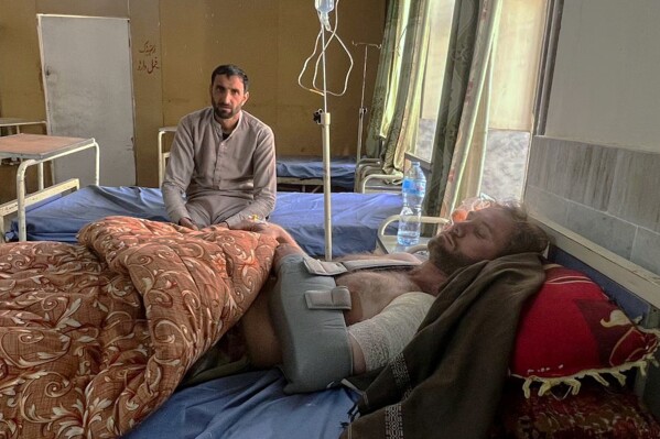 A man, who was injured in the overnight cross border fighting between Pakistan and Afghan forces, receives treatment at a hospital in Khar, in Bajaur, a district of Pakistan's Khyber Pakhtunkhwa province bordering with Afghanistan, Friday, Feb. 27, 2026. (AP Photo/Anwarullah Khan)