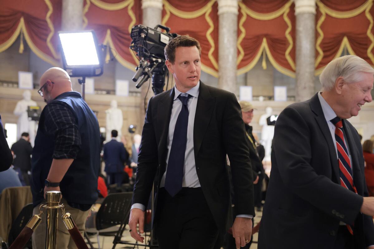 David Ellison, the chairman of Paramount Skydance Corp. walks through Statuary Hall to the State of the Union address