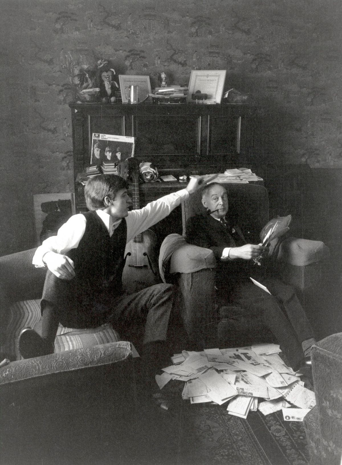 Photo of BEATLES and Mike McGEAR and Paul McCARTNEY; Paul McCartney's brother, Mike McGear with their father James McCartney at home at 20 Forthlin Road surrounded by fan-mail