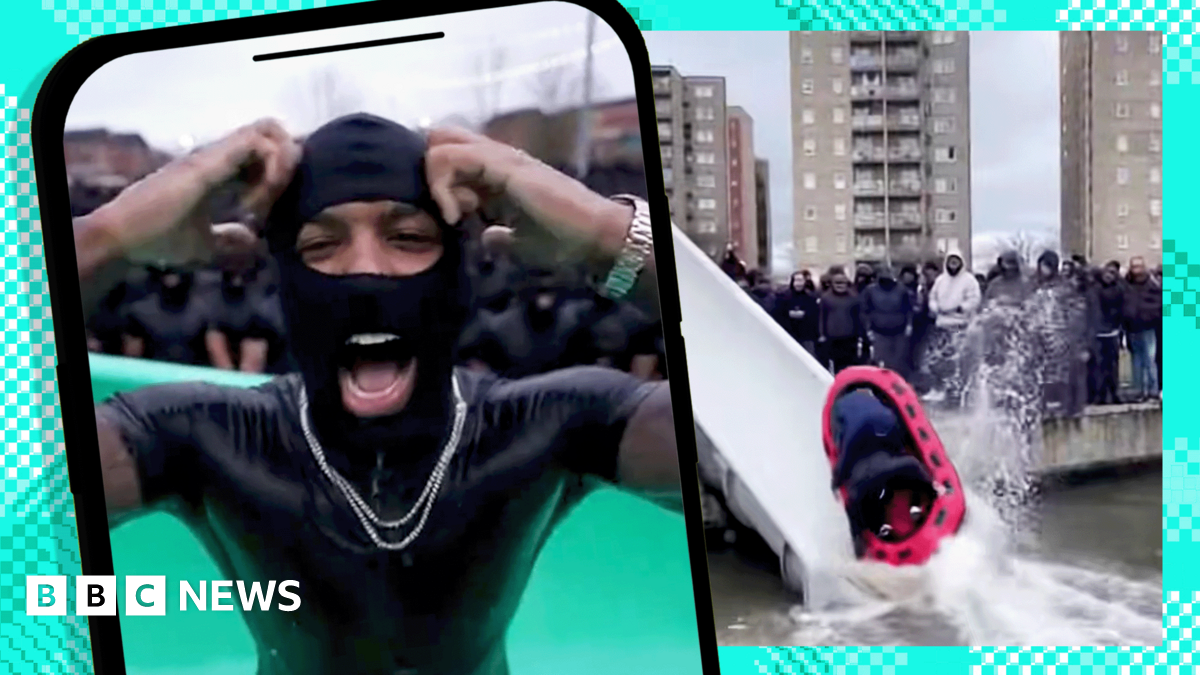A composite image showing a graphic of a phone with an image of a young black man wearing a black balaclava and a gold chain shouting and raising his hands. In the background is a still from an AI video showing a waterslide with a red dinghy sliding down it into dirty water, with tower blocks and a crowd of young men in hoodies and balaclavas.
