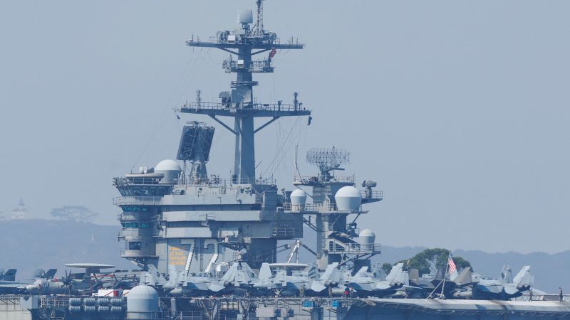 US carrier shoots down Iranian drone as tensions escalate and diplomatic talks hit a snag