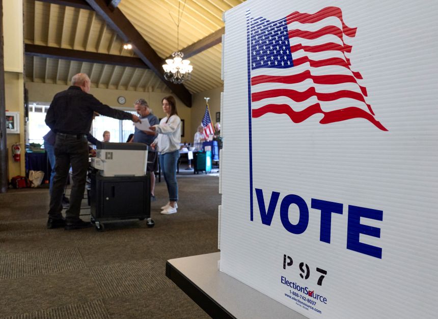 Voters cast their ballots at a polling station during California's special election on Proposition 50, a measure that would temporarily redraw congressional districts, in El Dorado Hills, California, on November 4, 2025.