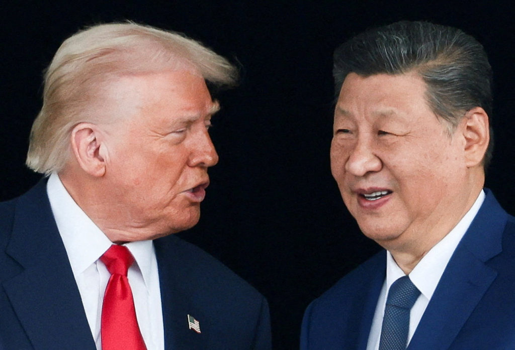FILE PHOTO: U.S. President Donald Trump meets with Chinese President Xi Jinping on the sidelines of the APEC summit, in Busan