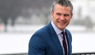 U.S. Defense Secretary Hegseth administers the oath during a U.S. Army National Guard re-enlistment ceremony at the Washin...