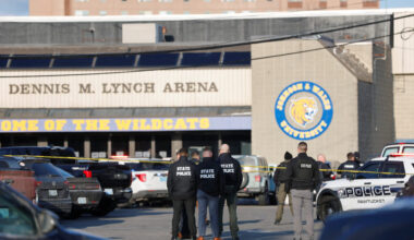 Police and emergency vehicles are seen outside the Dennis M Lynch Arena, an indoor ice skating rink, after a shooting in P...