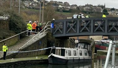 Police update after man climbed pylon in Brighouse