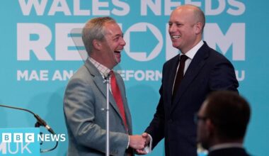 Reform UK's Welsh leader Dan Thomas announced by Nigel Farage at rally in Newport