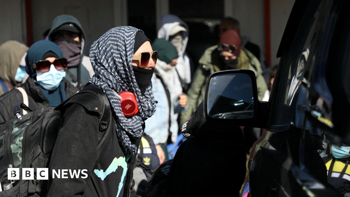 Members of Australian families believed to be linked to the Islamic State militants leave Roj camp near Derik, Syria February 16, 2026.