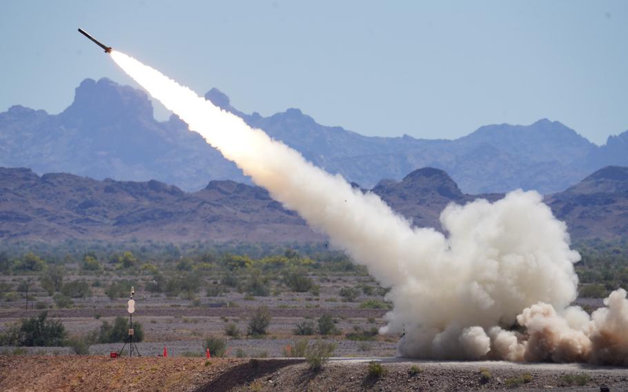 A missile is launched in the desert.