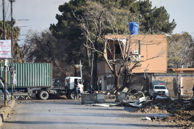 Security personnel stand at the blast site in Quetta on Feb. 1, a day after an attack by Baloch separatists.