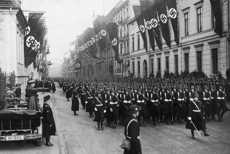 Hitler Salutes SS Bodyguard