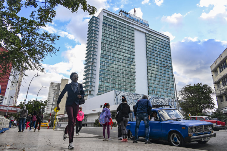 People are seeing walking in Havana, Cuba.