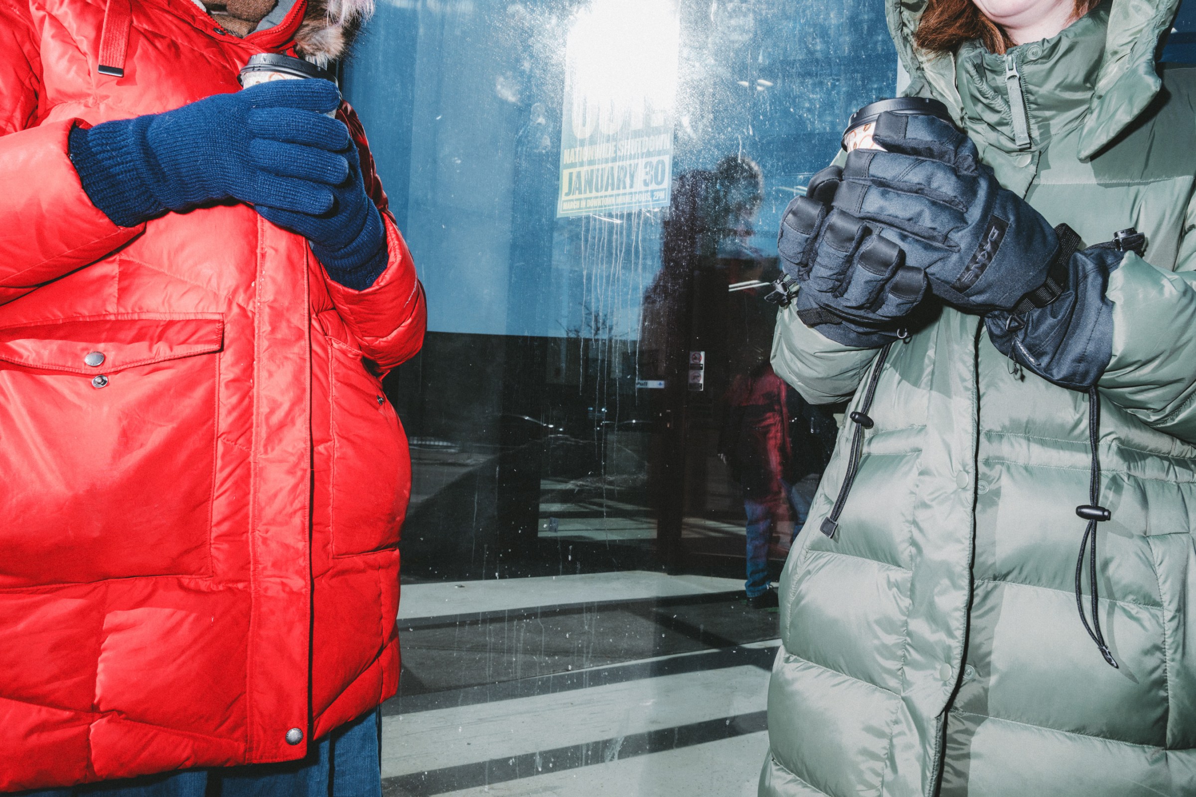 Patrollers keep an eye out for ICE activity outside Karmel Mall in Minneapolis.