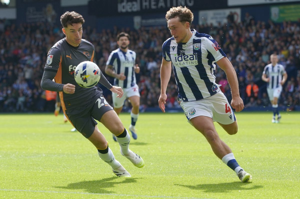 West Bromwich Albion's Callum Styles (left) and Derby County’s Max Johnston battle for the ball 
