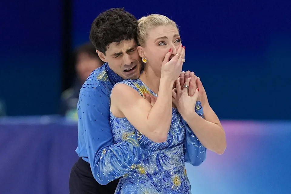 Piper Gilles and Paul Poirier of Canada react after competing during the ice dancing free skate in figure skating at the 2026 Winter Olympics, in Milan, Italy, Wednesday, Feb. 11, 2026. (AP Photo/Stephanie Scarbrough)