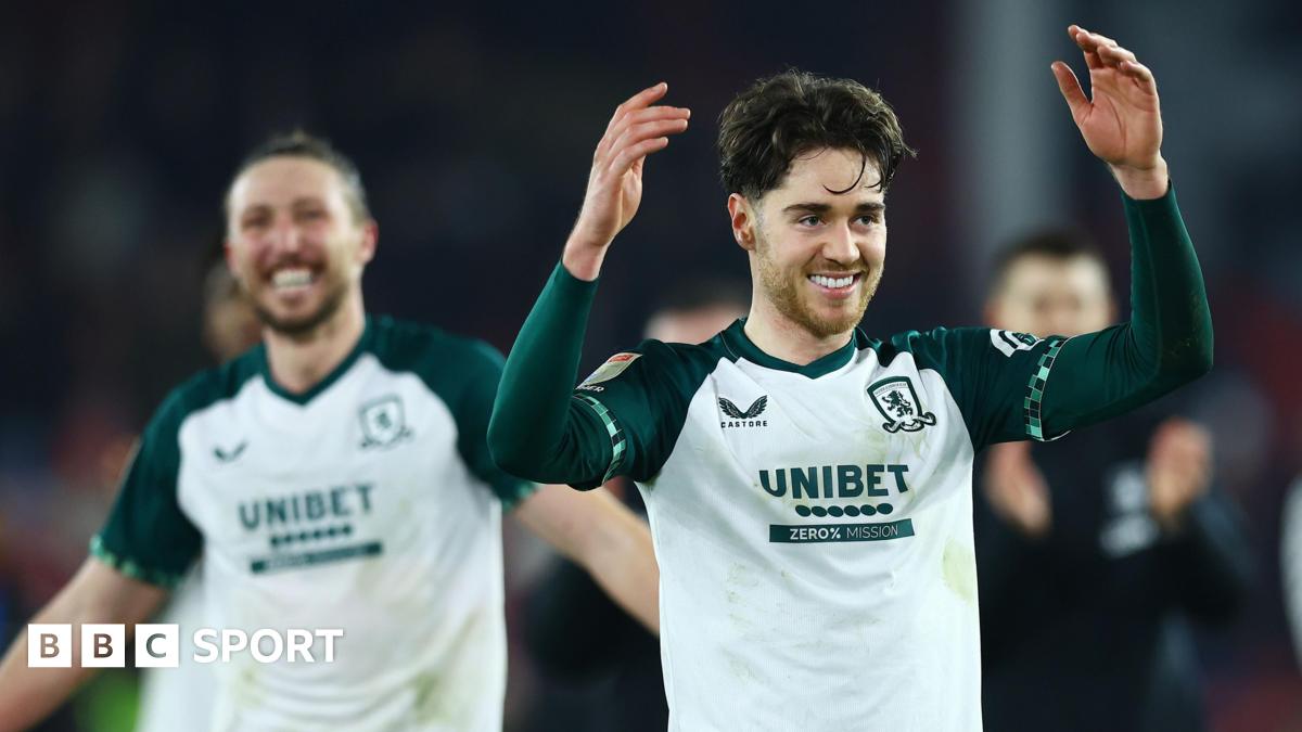 Hayden Hackney (to the forefront on the right) with his arms aloft and a big smile after Middlesbrough's win at Sheffield United with Luke Ayling (behind him in the background on the left)
