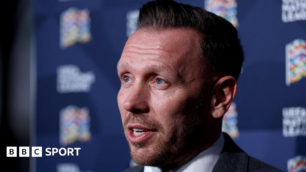 Craig Bellamy is interviewed at the Nations League draw in Brussels