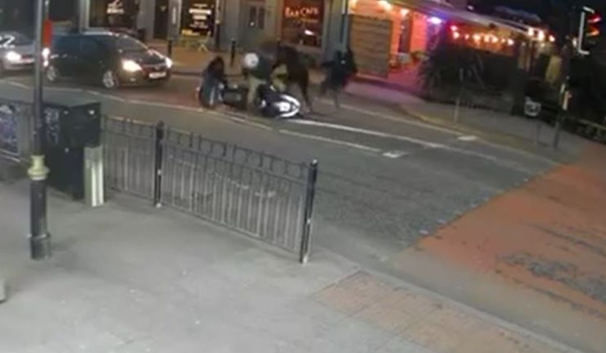 Horrified witnesses watched on as the delivery driver was threatened with the blades by a group of young boys