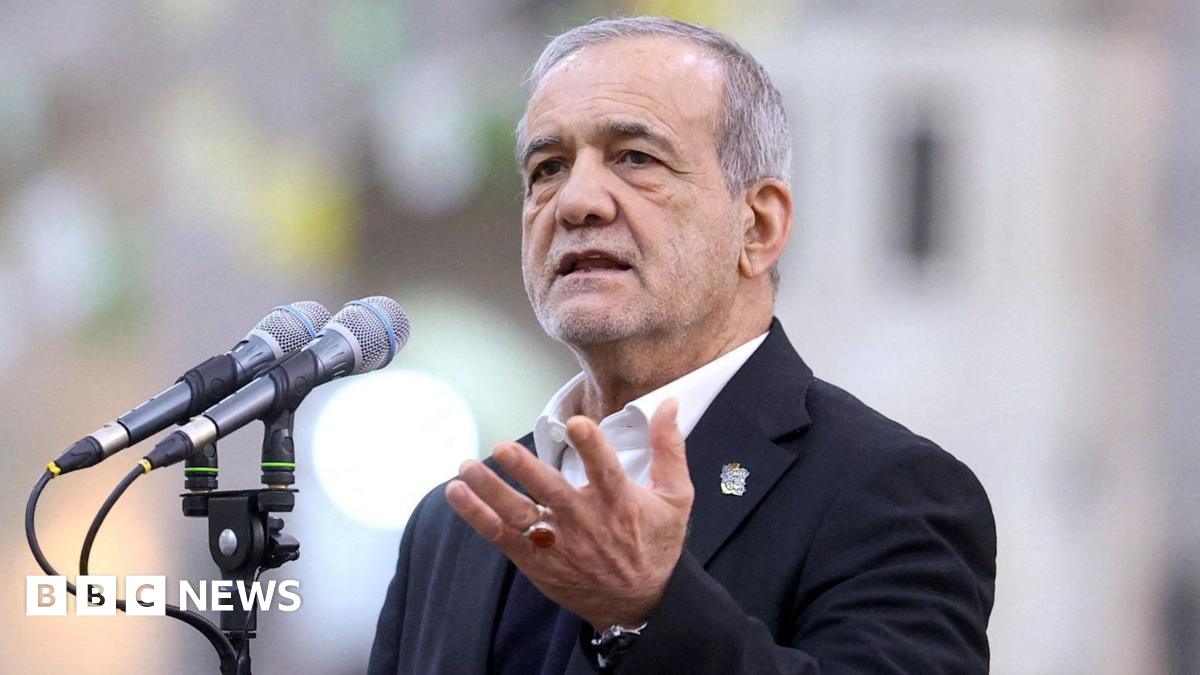 Iranian President Mahmoud Pezeshkian speaks at a podium on 31 January.