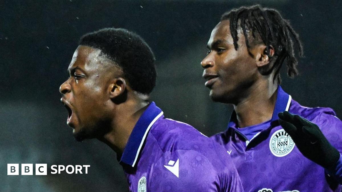 St Mirren manager Stephen Robinson with a graphic of recent results